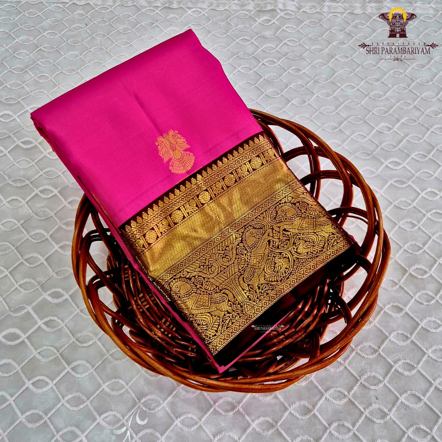 A radiant Rani Pink body that reflects timeless elegance Saree