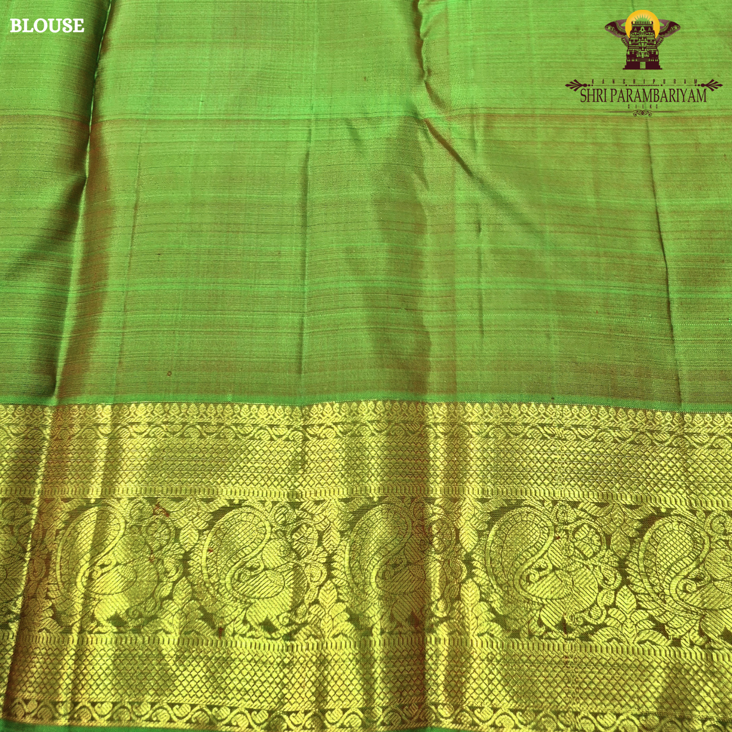 A elegant bright rani pink with rich gold zari border and a hint of green edging Saree