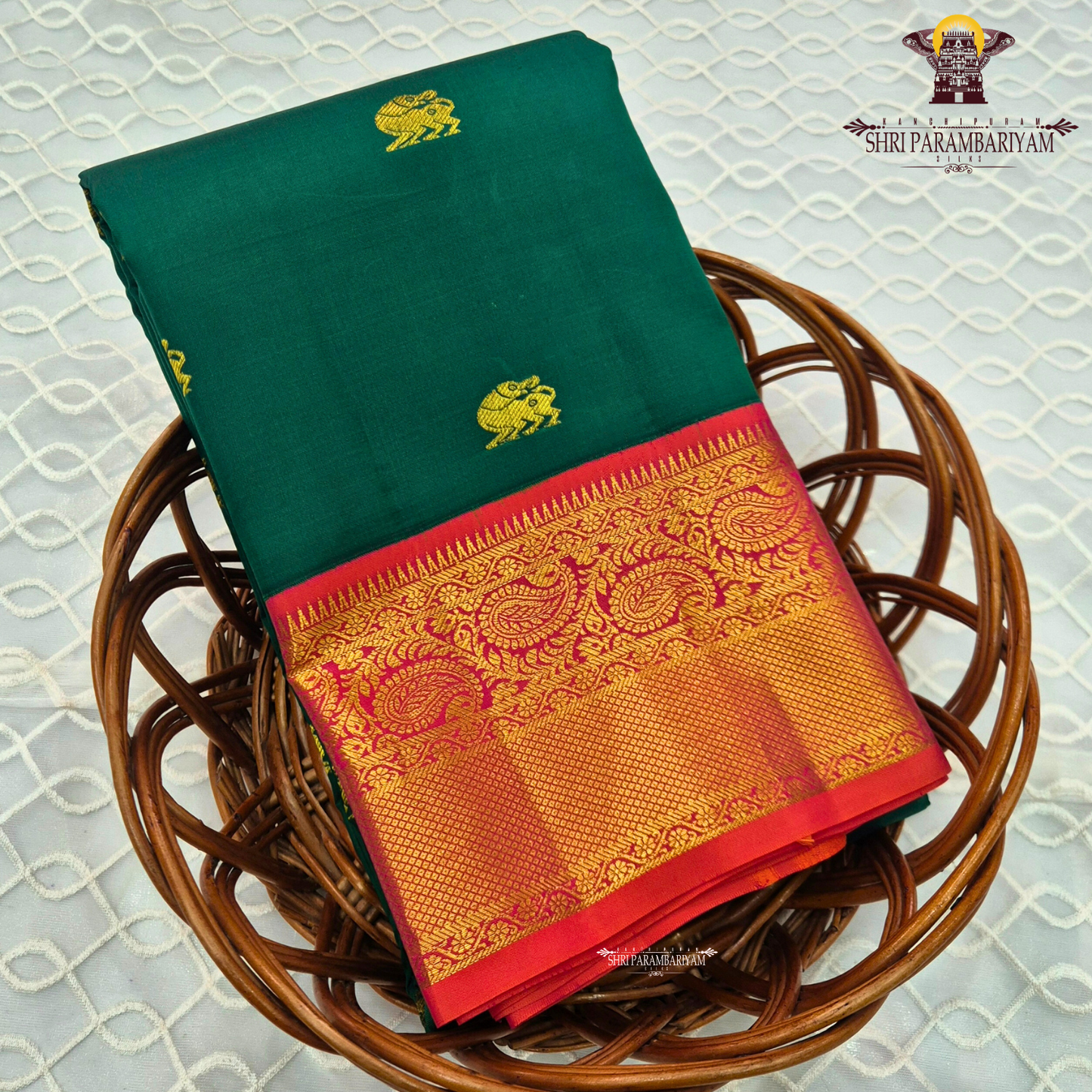 A traditional bottle green silk saree beautifully enhanced with pure gold zari weaving Saree