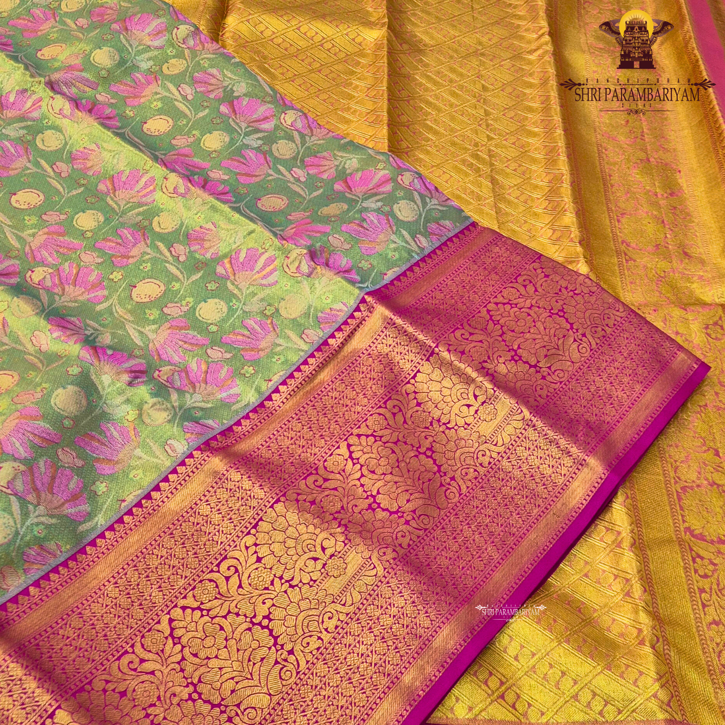 A beautiful parrot green / light leaf green body paired with a striking rani pink border Saree