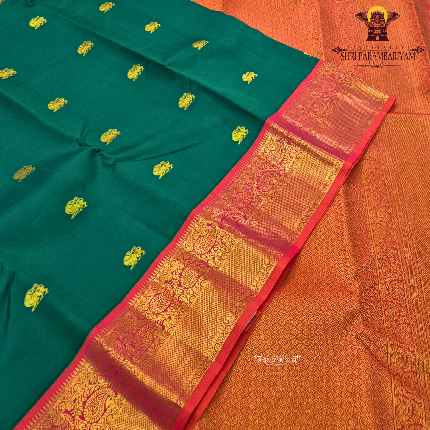 A traditional bottle green silk saree beautifully enhanced with pure gold zari weaving Saree