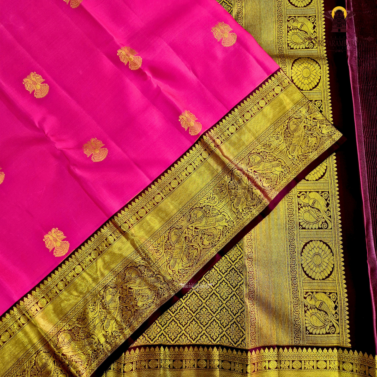 A radiant Rani Pink body that reflects timeless elegance Saree