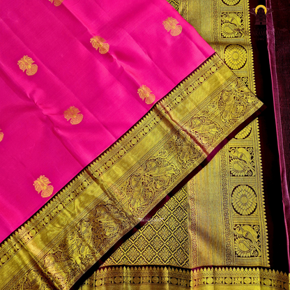 A radiant Rani Pink body that reflects timeless elegance Saree