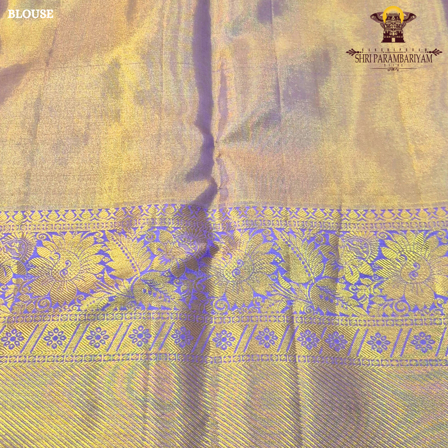 A rich combination of royal purple (violet) body with antique gold tissue Saree
