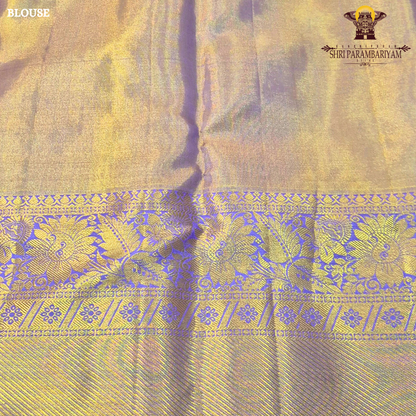 A rich combination of royal purple (violet) body with antique gold tissue Saree
