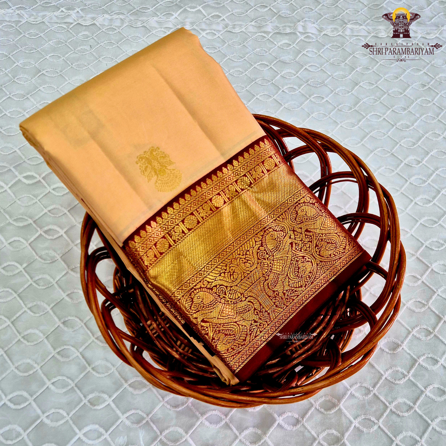 A classic Ivory Cream / Off-White body with a rich Maroon Korvai Border Saree