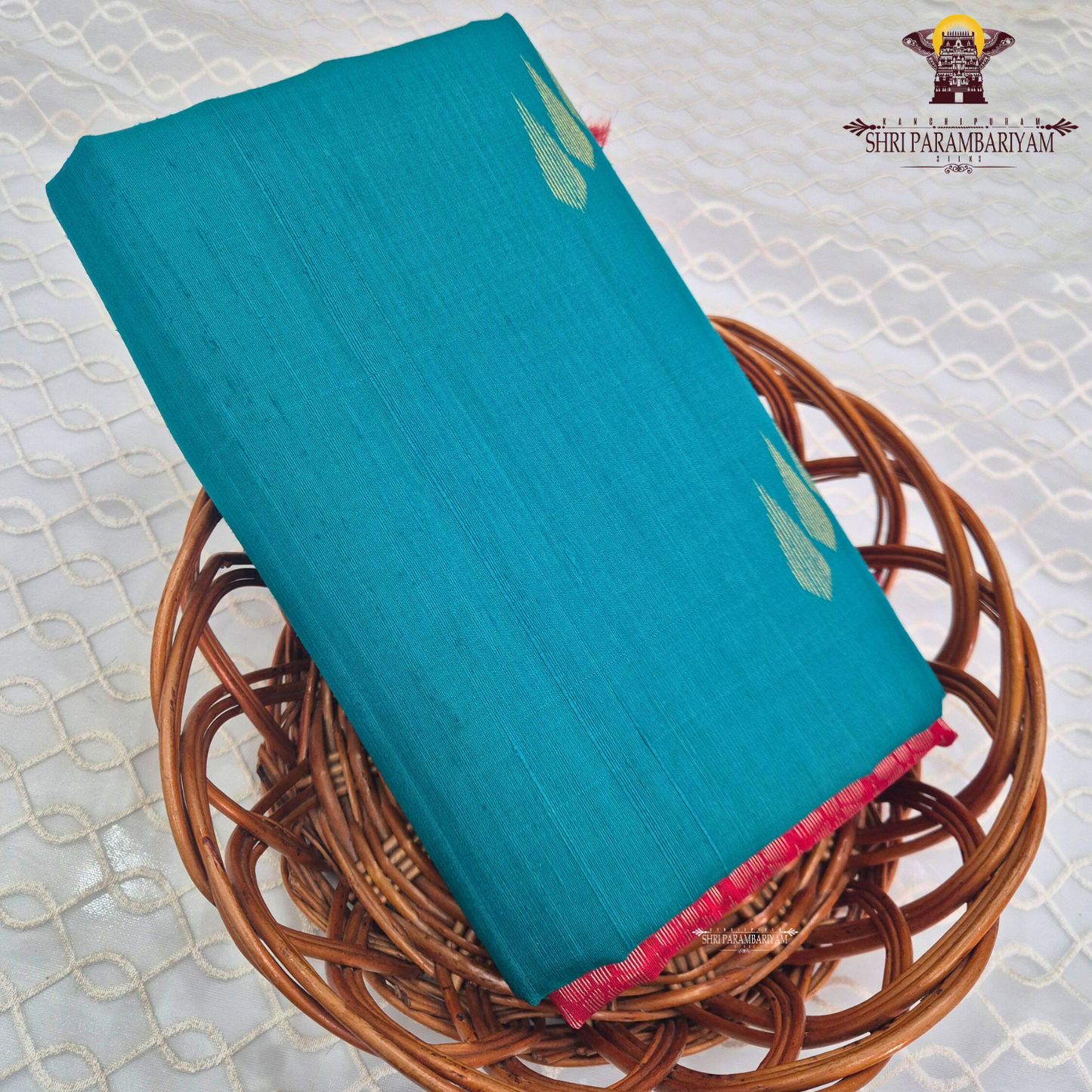 Elegant peacock teal blue (a rich blend of blue and green tones) Saree
