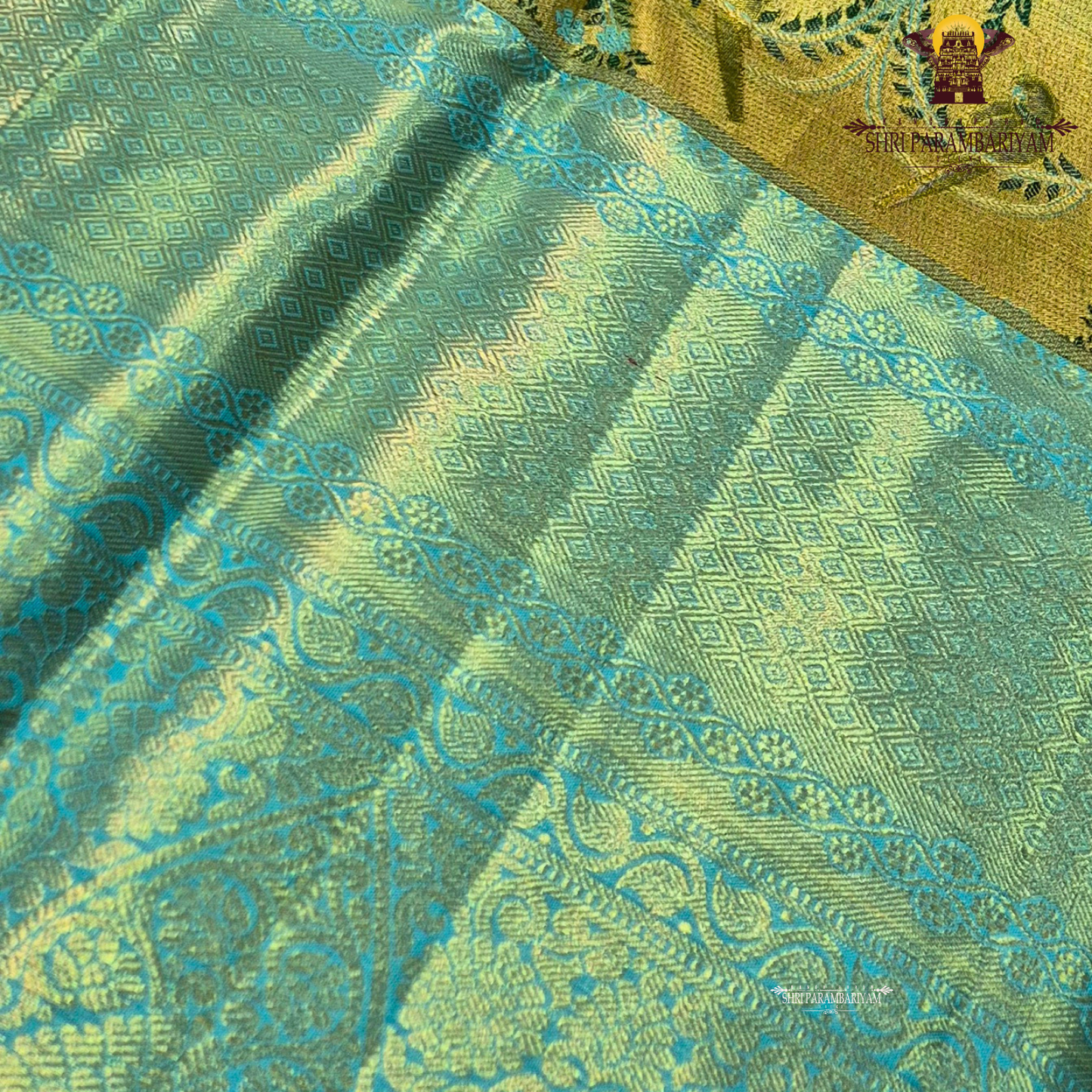 A refreshing combination of aqua blue (turquoise) and antique gold Saree