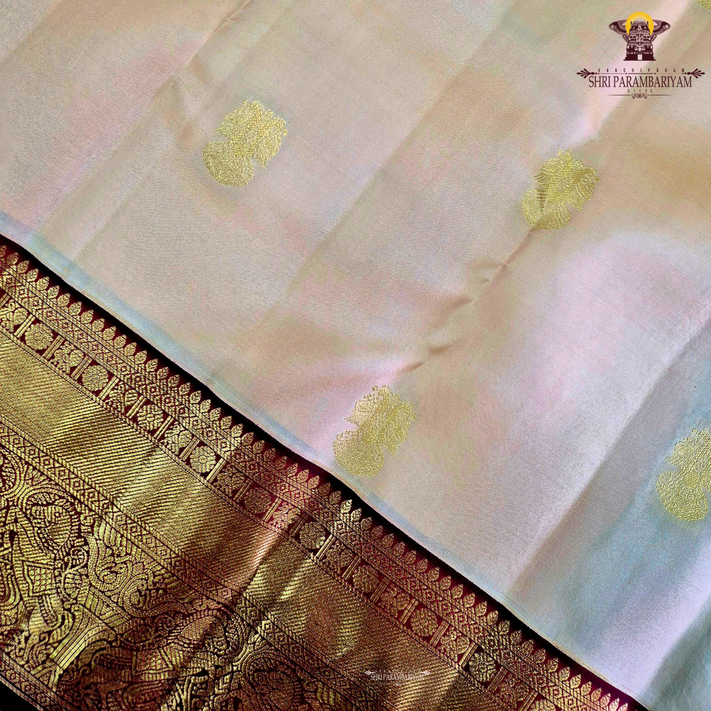 A classic Ivory Cream / Off-White body with a rich Maroon Korvai Border Saree