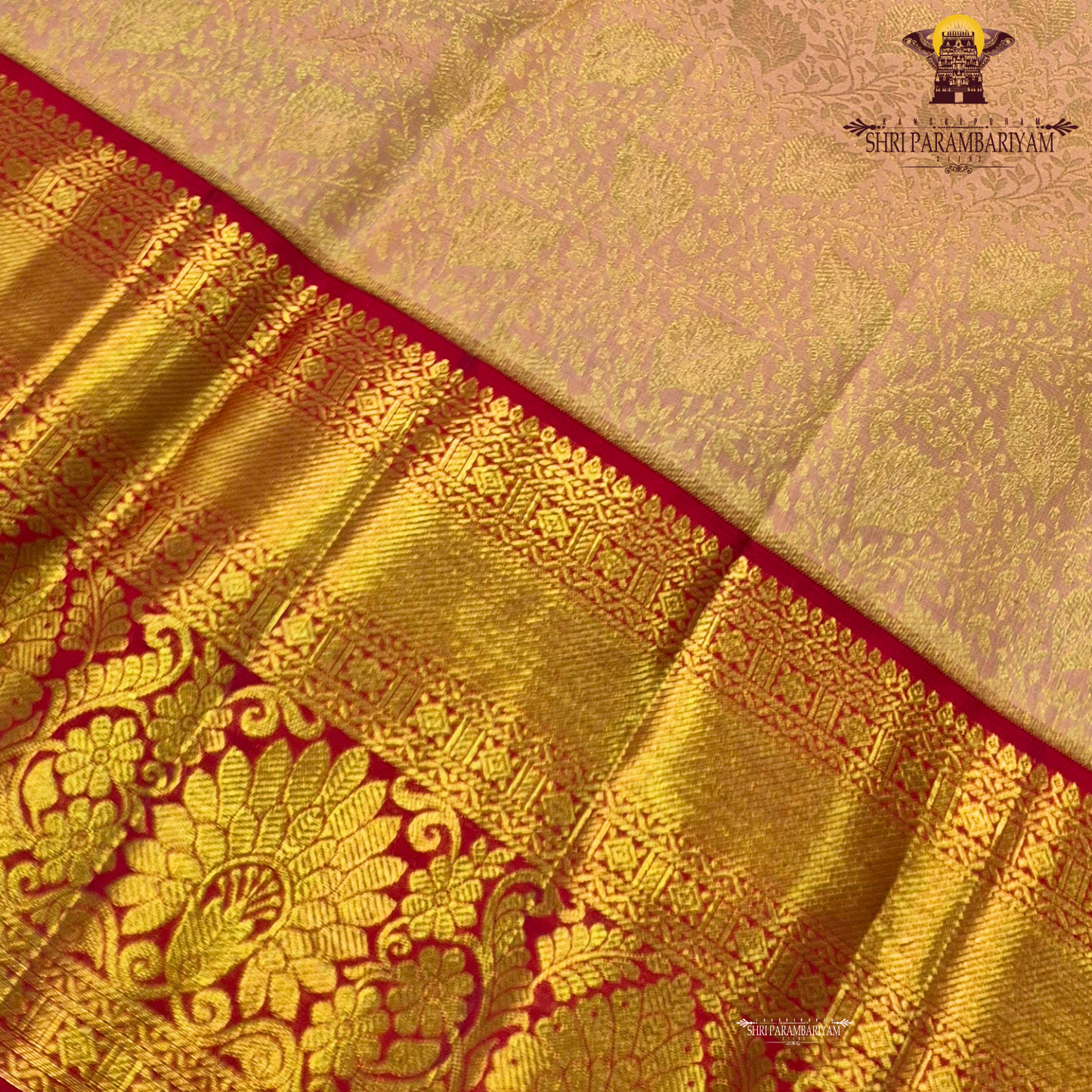 A soft pastel peach body paired with a rich deep red korvai border Saree