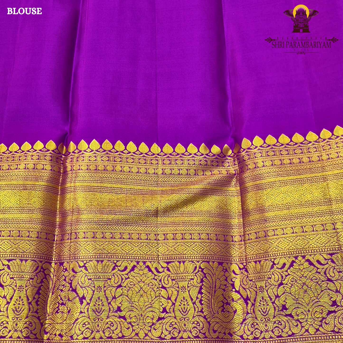 A vibrant purple and gold combination, with a rich golden zari Saree