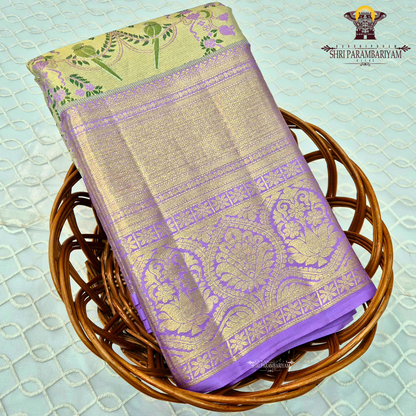 A graceful dual-tone combination of pastel pista green and soft lavender purple Saree