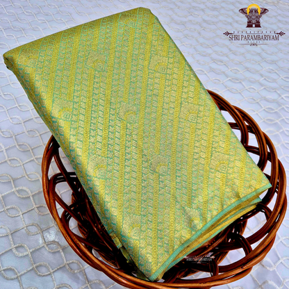 A beautiful sea green base highlighted with rich golden tissue weaving Saree