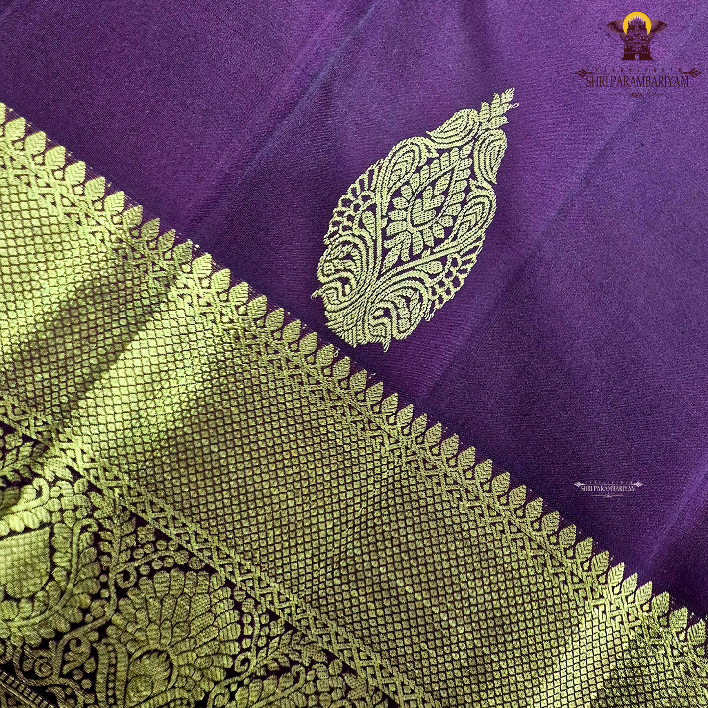 A rich Wine Maroon / Deep Burgundy with a subtle dual-tone silk sheen Saree