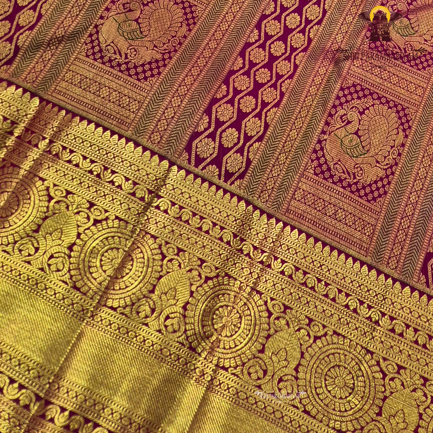 Deep magenta-red (rani red tone) with rich antique gold zari Saree