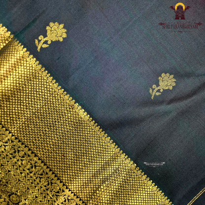A classic Dark Bottle Green with rich Gold zari Saree