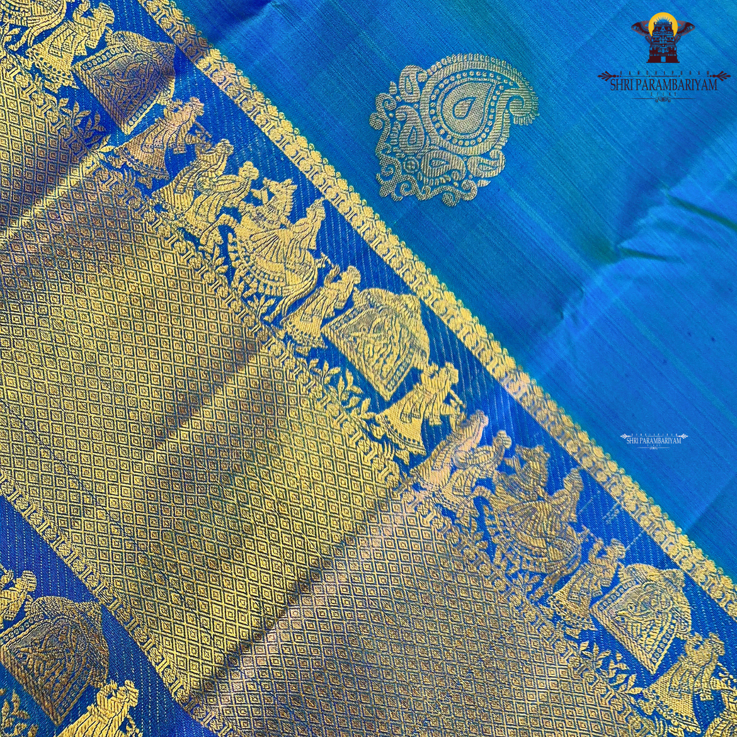 A stunning Royal Blue with Peacock Blue dual-tone shade Saree