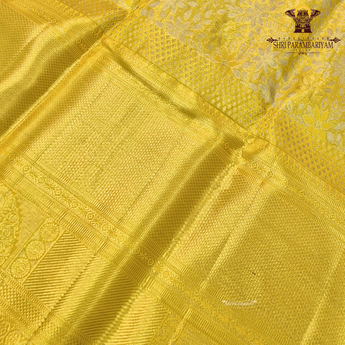 A vibrant bright golden yellow shade that radiates traditional elegance and festive Saree