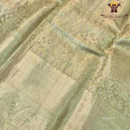 A beautiful light pistachio gold shade that gives a soft and graceful shine Saree