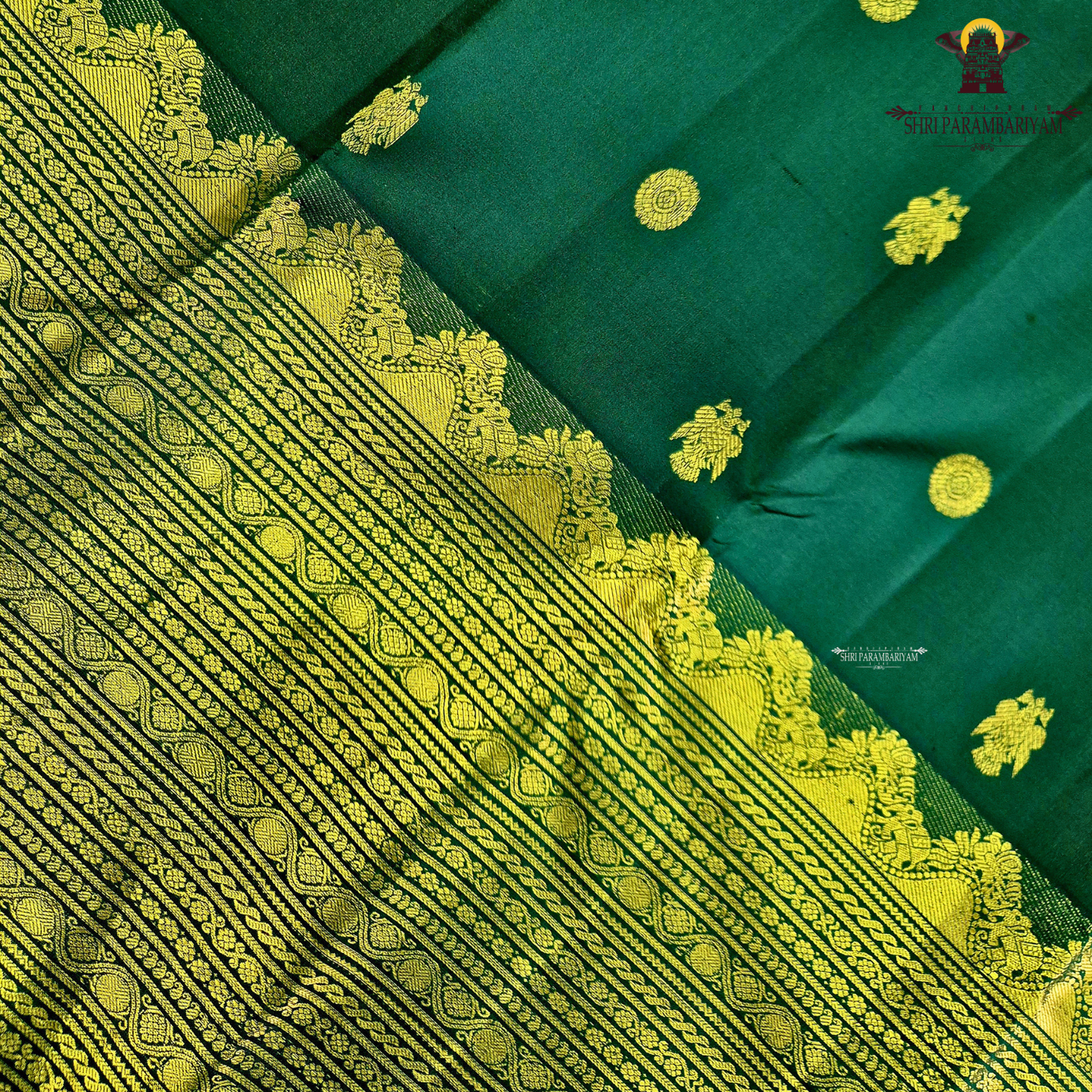 A deep Bottle Green with luxurious gold zari weaving Saree