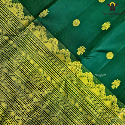 A deep Bottle Green with luxurious gold zari weaving Saree