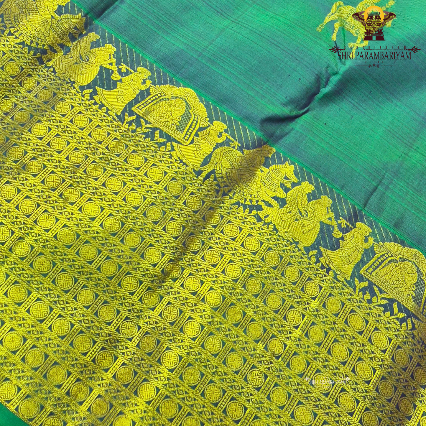 A elegant Dual-tone Teal Green with Royal Blue and Antique Gold Zari Saree