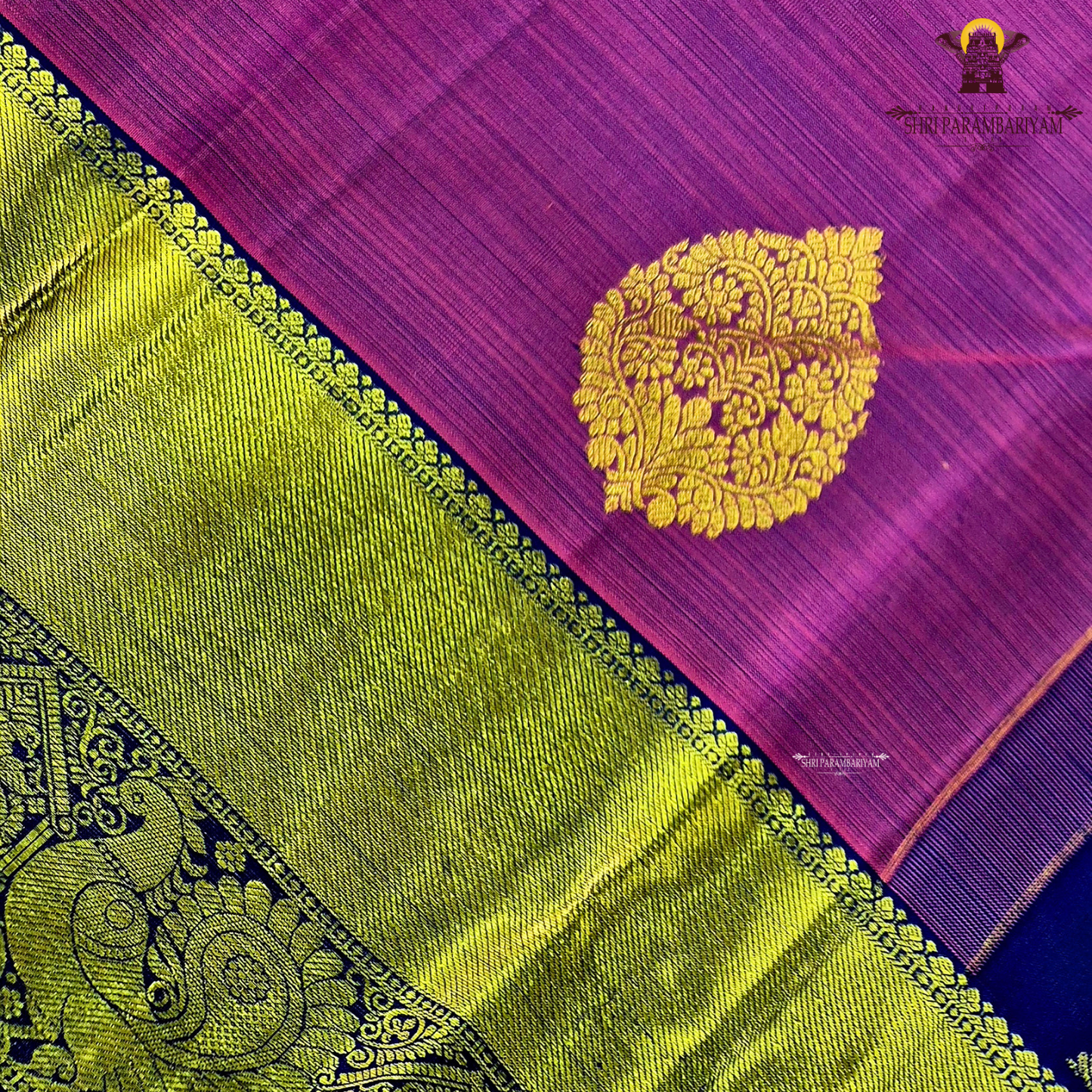 A vibrant magenta purple shade, featuring elegant zari Saree