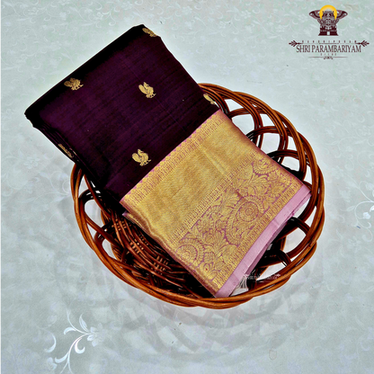 Rich deep maroon (wine shade) body with a lustrous gold zari Saree