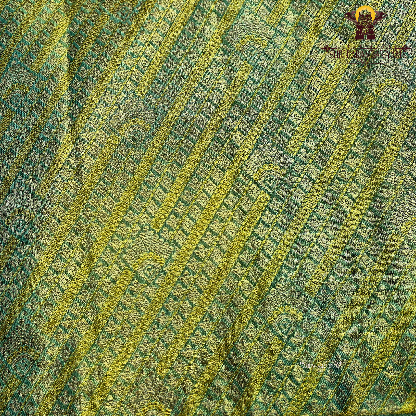 A beautiful sea green base highlighted with rich golden tissue weaving Saree