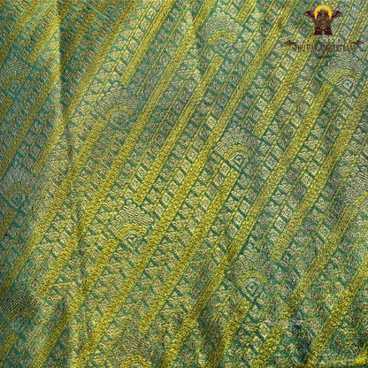A beautiful sea green base highlighted with rich golden tissue weaving Saree