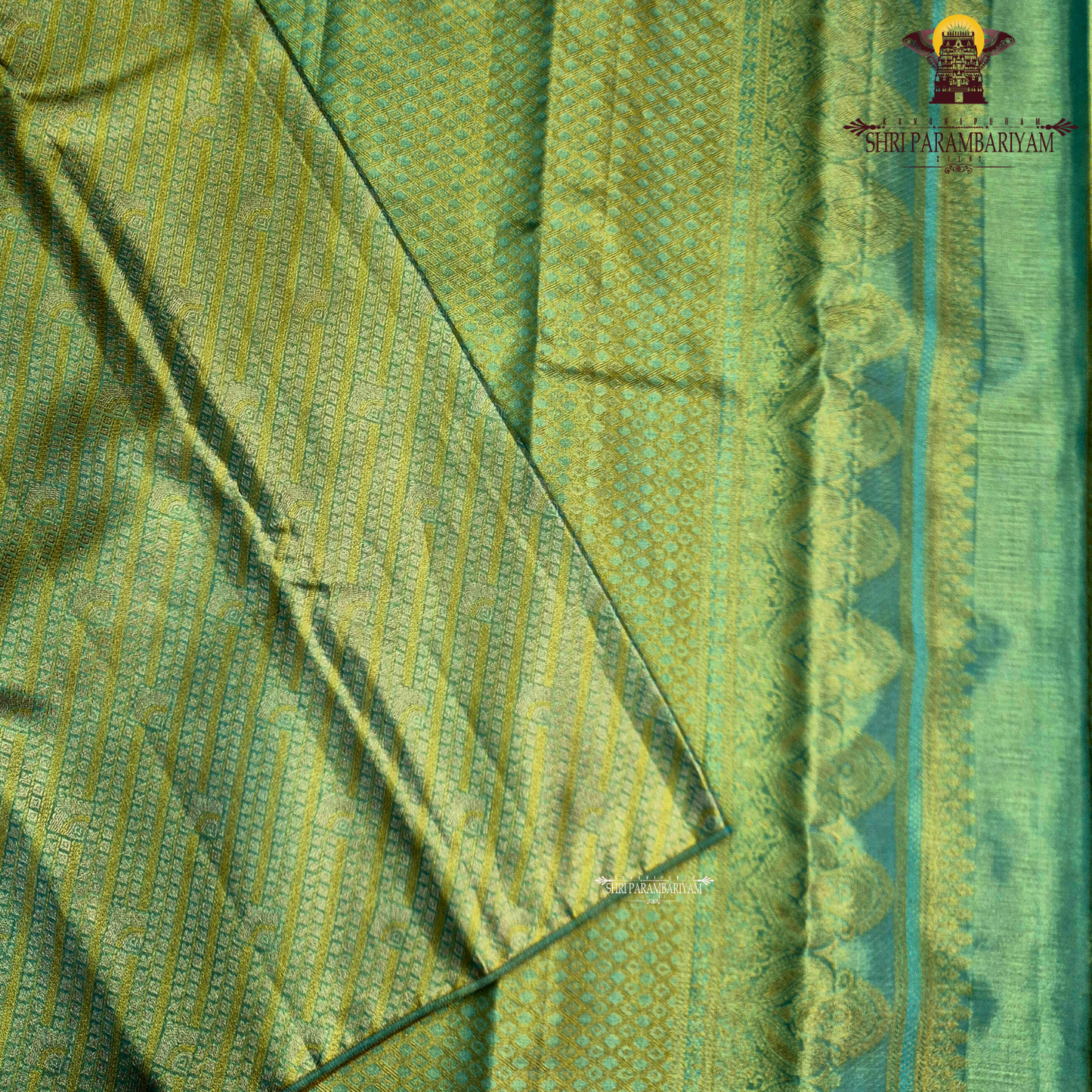 A beautiful sea green base highlighted with rich golden tissue weaving Saree
