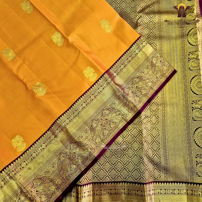A radiant Mustard Orange / Marigold Orange body with a rich Maroon Korvai Border Saree