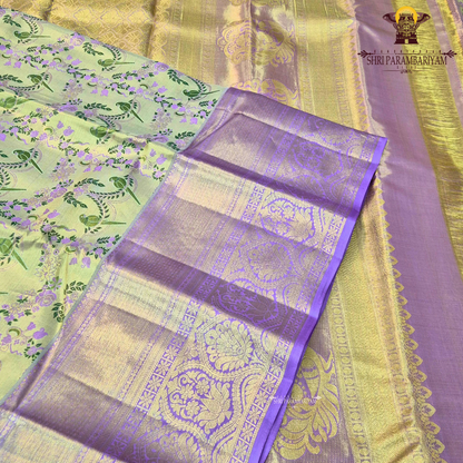 A graceful dual-tone combination of pastel pista green and soft lavender purple Saree