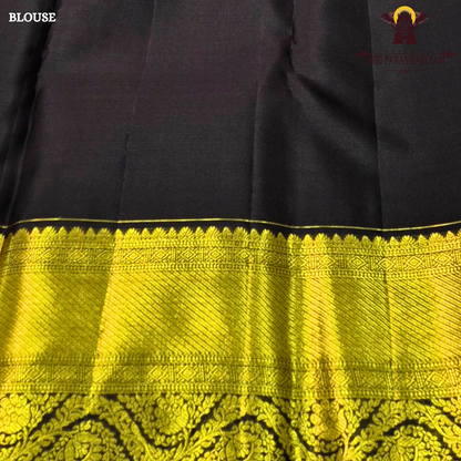 A soft beige gold body with a contrasting coffee brown korvai border enriched Saree