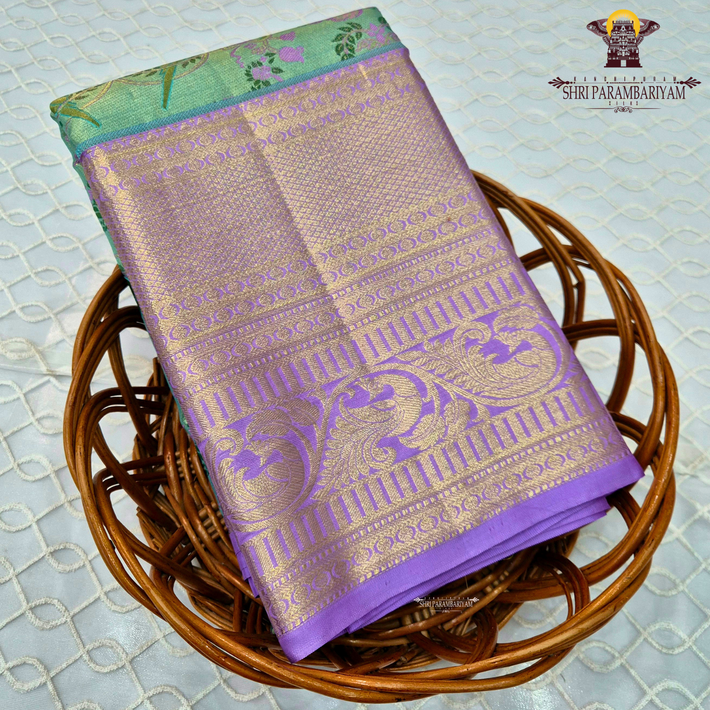 A refreshing dual-tone of mint green (pista green) and soft lavender purple Saree