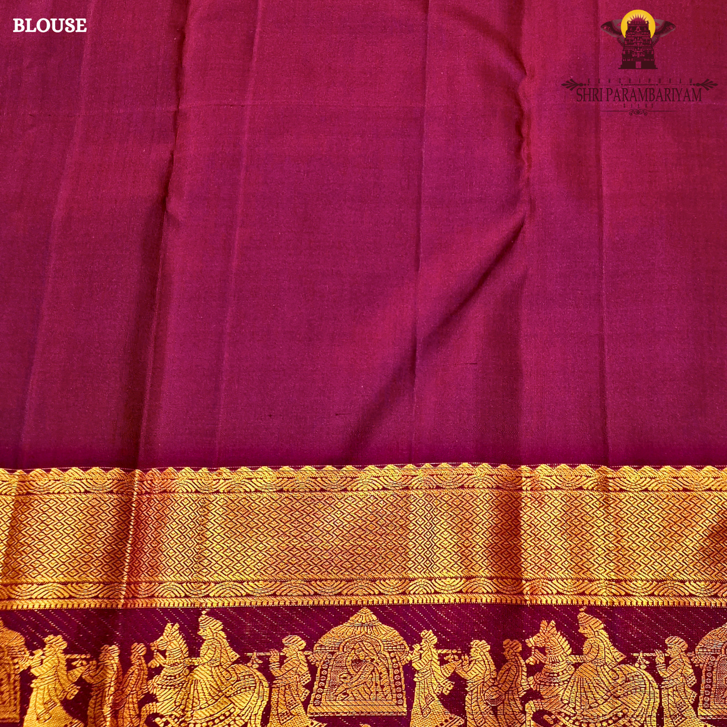A elegant steel grey with rich gold zari border and contrast maroon/purple edging Saree