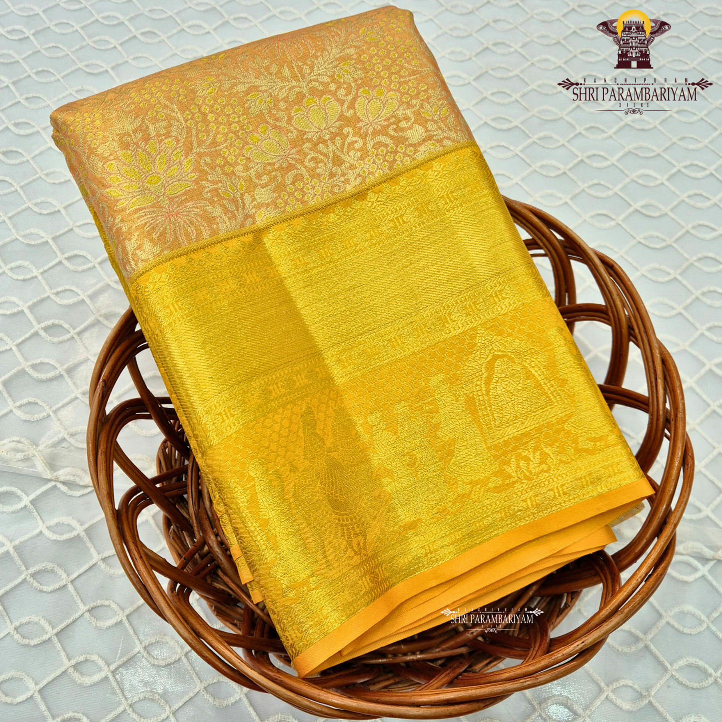Soft peach / pastel orange with golden yellow (zari gold) border Saree