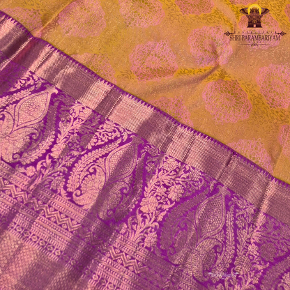 A rich mustard gold (yellow-orange) body paired with a vibrant rani pink Saree