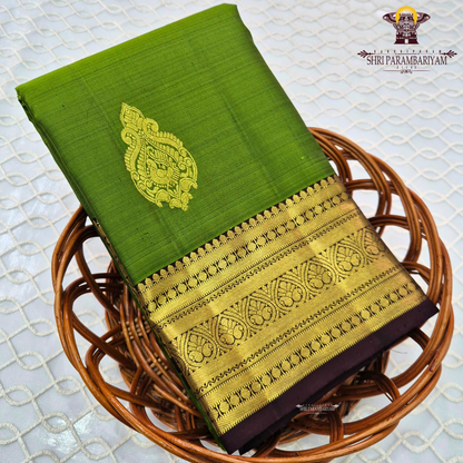 A rich Parrot Green (fresh leaf green tone) with a rich Gold zari Saree