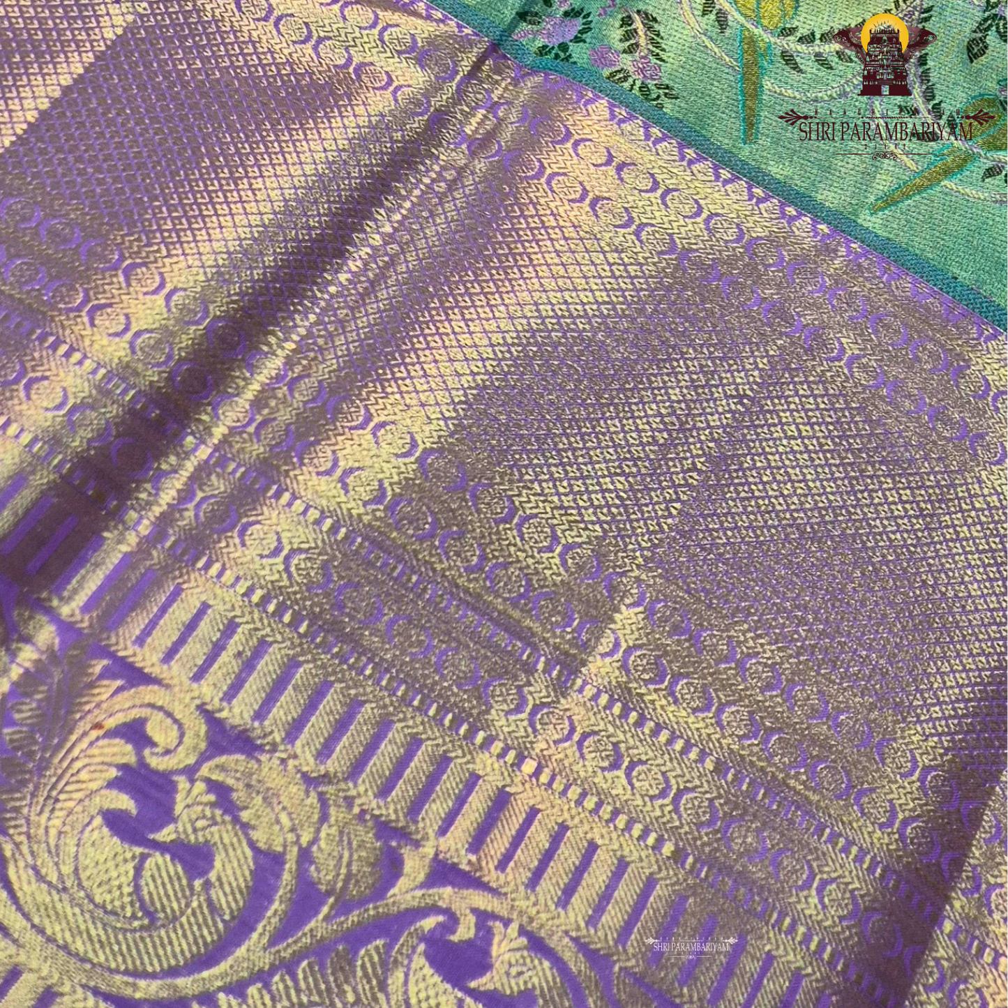 A refreshing dual-tone of mint green (pista green) and soft lavender purple Saree
