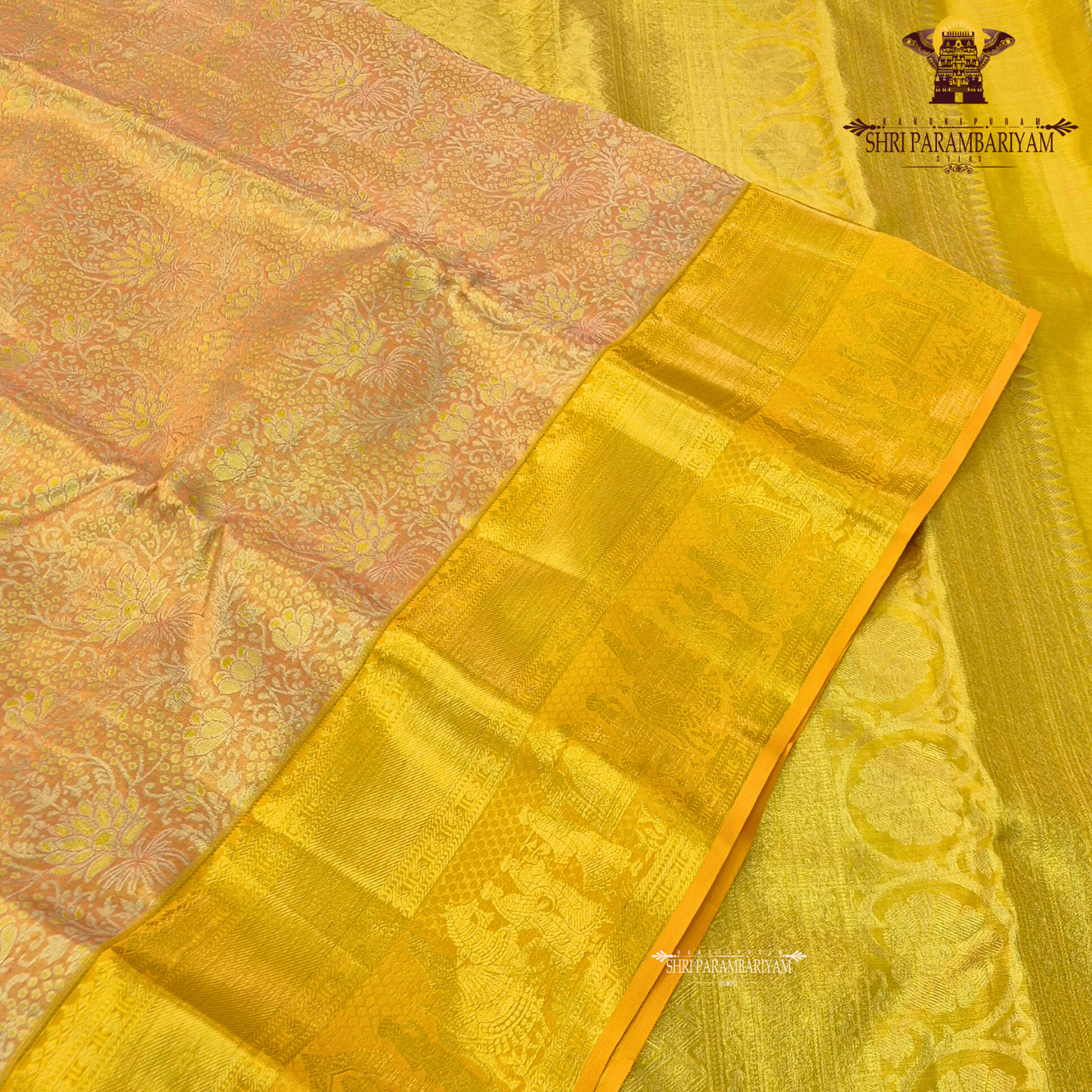 Soft peach / pastel orange with golden yellow (zari gold) border Saree