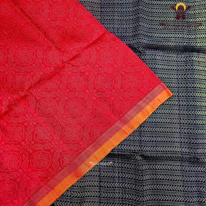 Vibrant ruby red with self-woven tonal motifs Saree