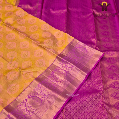 A rich mustard gold (yellow-orange) body paired with a vibrant rani pink Saree