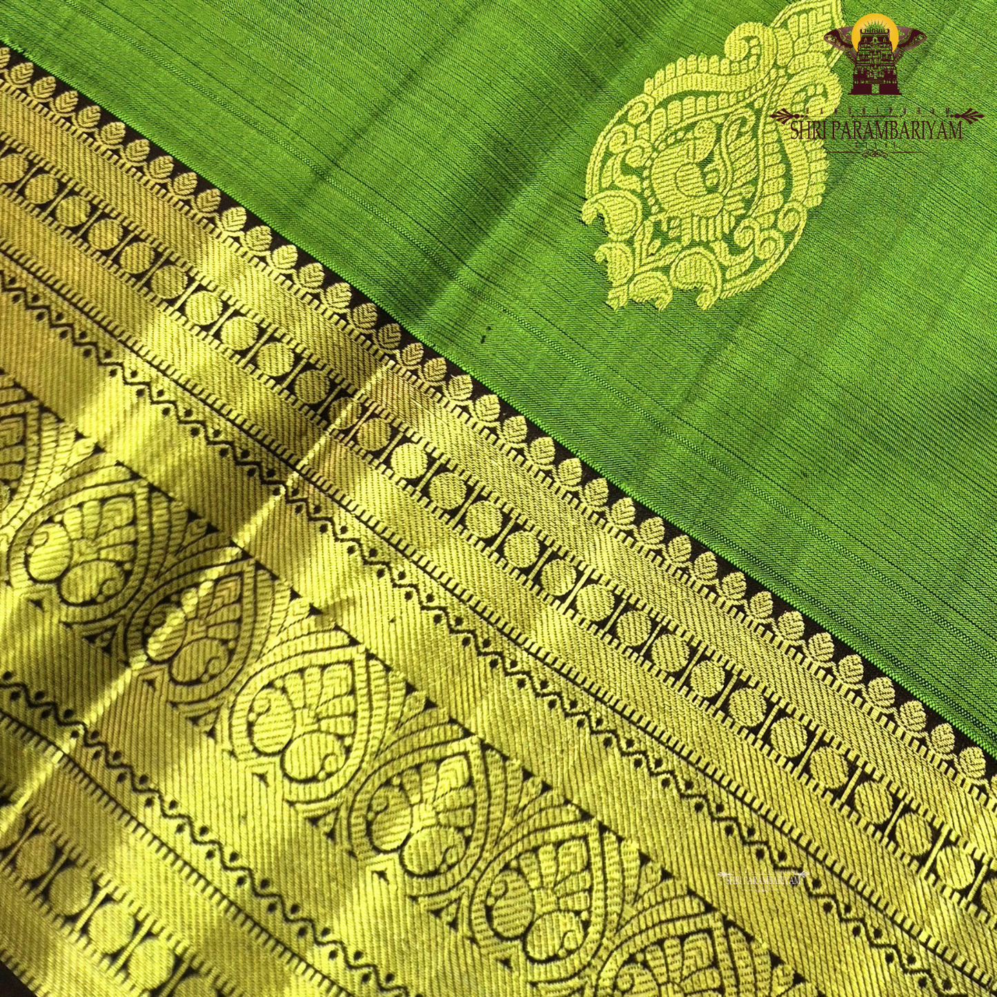 A rich Parrot Green (fresh leaf green tone) with a rich Gold zari Saree