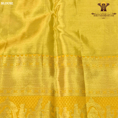 Soft peach / pastel orange with golden yellow (zari gold) border Saree