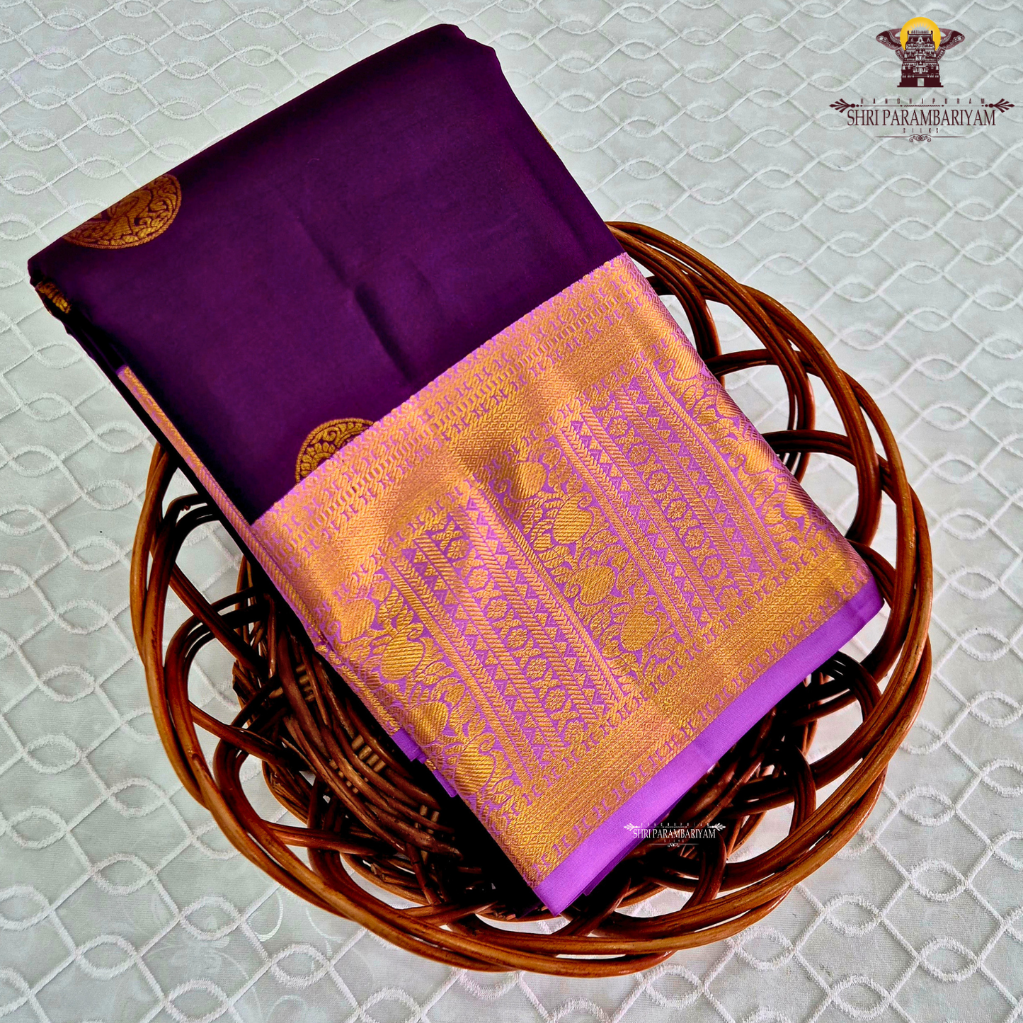 A luxurious deep violet body that radiates regal charm and sophistication Saree