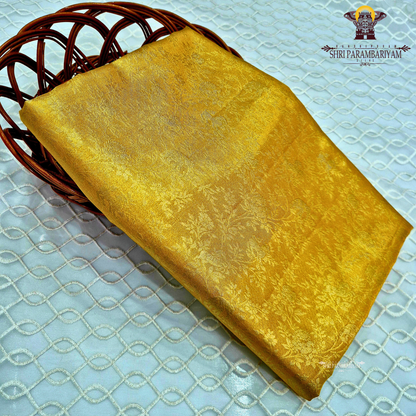 A rich antique gold shade that radiates elegance and traditional charm Saree