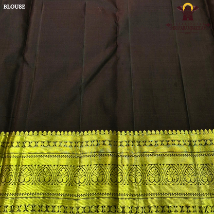 A rich Parrot Green (fresh leaf green tone) with a rich Gold zari Saree