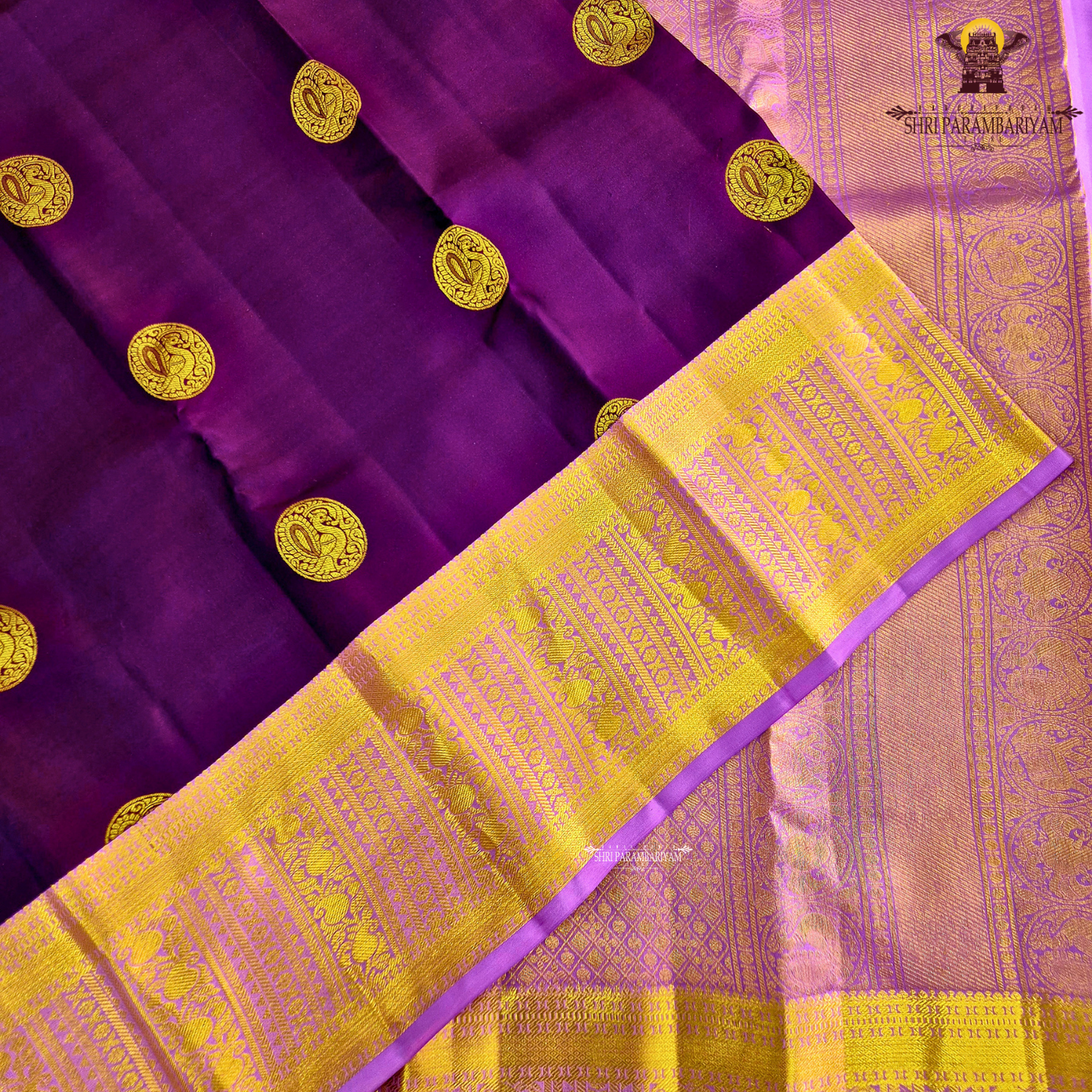 A luxurious deep violet body that radiates regal charm and sophistication Saree