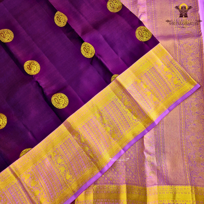 A luxurious deep violet body that radiates regal charm and sophistication Saree